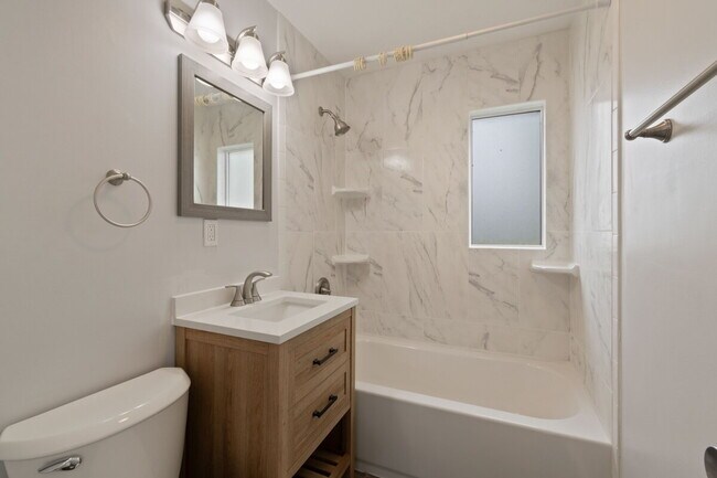 Building Photo - This charming, 4 bedroom 2 bath updated bungalow in the heart of Ogden for $2150 a month