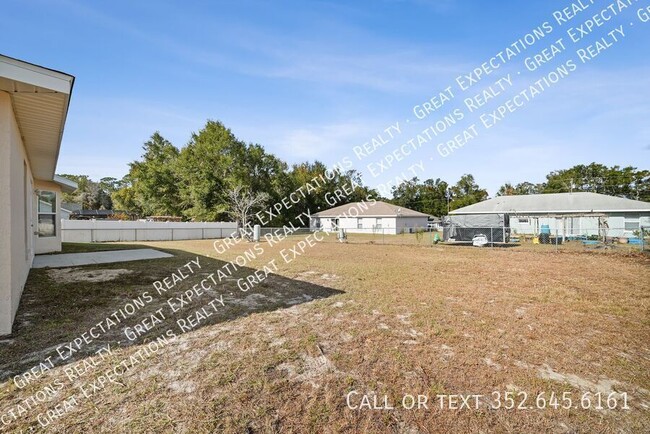 Building Photo - Fenced & Tiled 3/2/2 Summerfield Home For ...