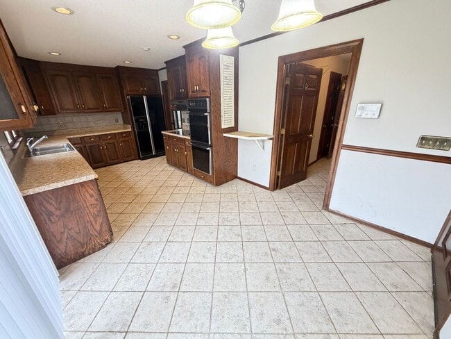 Building Photo - Inviting 3-Bedroom Brick Ranch Oasis in China Grove