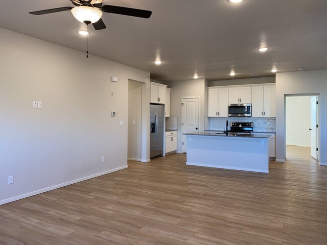 Building Photo - Stylish Second-Floor Condo w/ Two-Car Garage