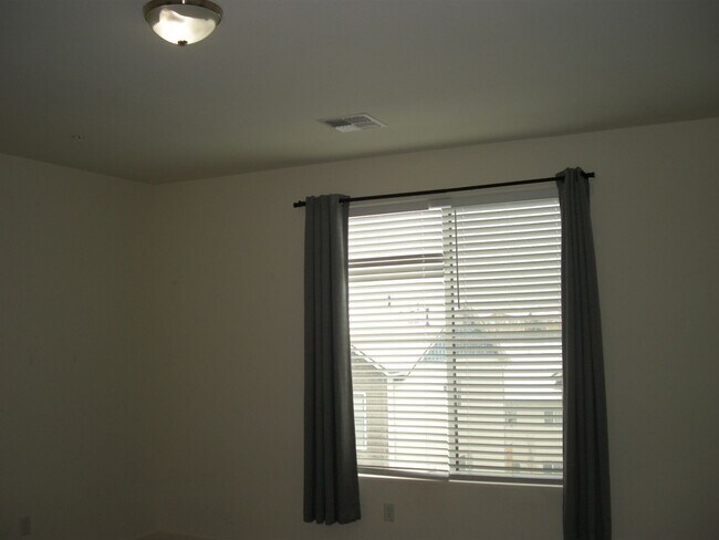 Building Photo - Two Bedroom, Two and and a Half Bath Townh...