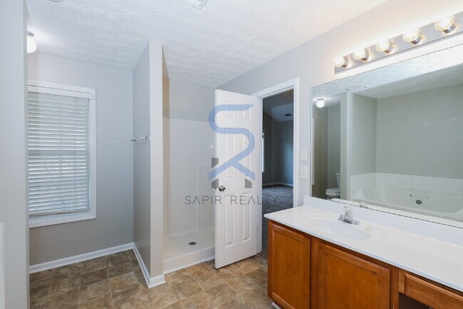 Building Photo - Move in before January 15th and choose your reward: a $250 Amazon Gift Card or a 55 Smart TV!