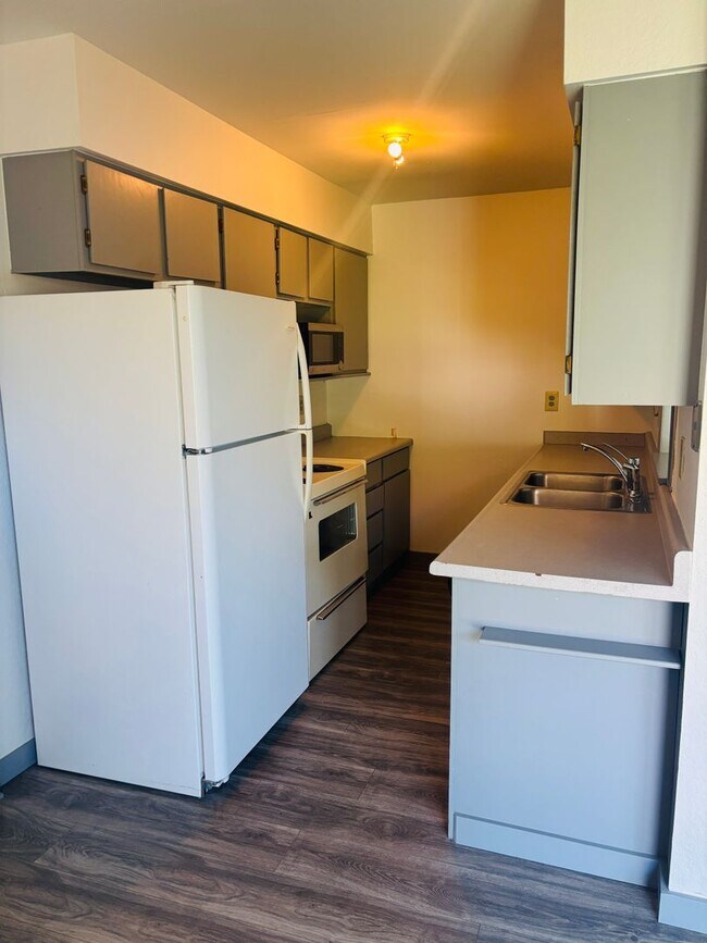 Building Photo - Renovated 3BR condo w/ garage & private yard **MOVE IN SPECIAL - See details below**