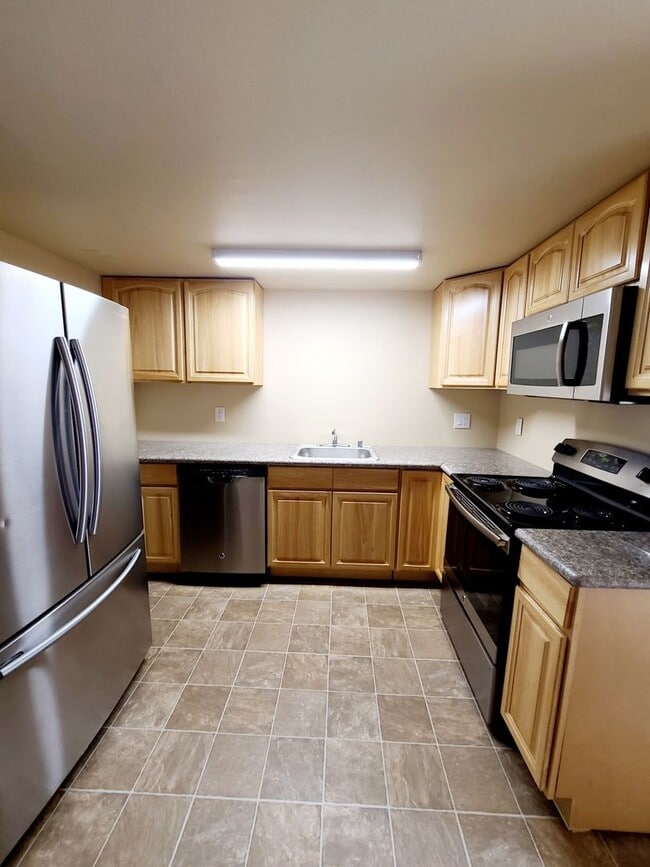 Building Photo - Totally remodeled. Impressive, open floor ...