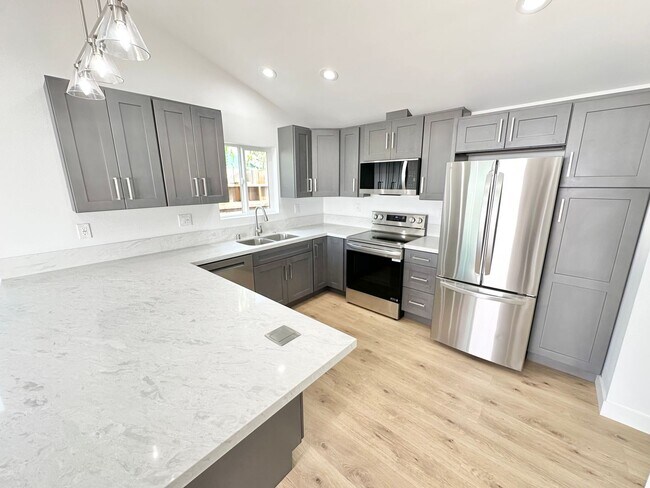 Building Photo - Stylishly Remodeled 2BD/1.5BA with Private Yard & In-Unit Laundry