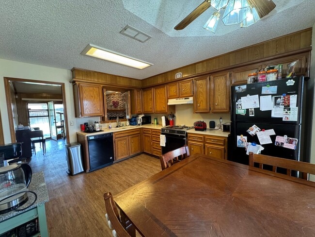 Building Photo - Available July 10th with storage shed & all appliances included!