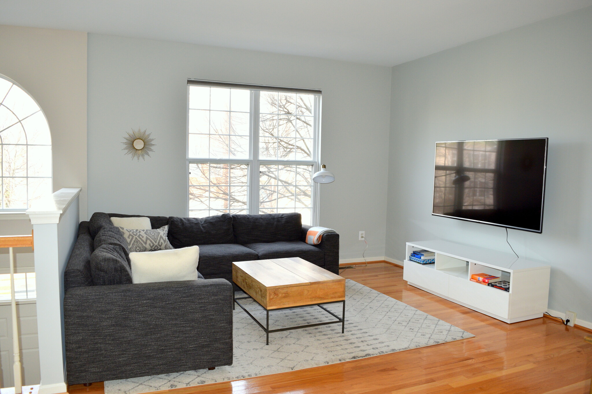 Living room with brand new west elm furniture and 65 inch TV - 11413 Sunflower Lane