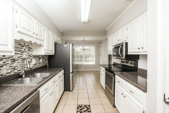 Building Photo - 8159 Creekside Cir N