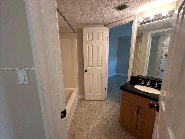Building Photo - 10401 W Broward Blvd