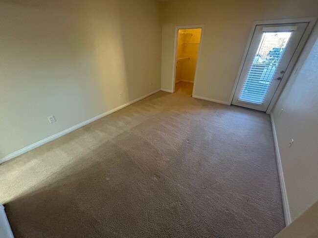 Building Photo - ADORABLE 2 BEDROOM 2 BATHROOM CONDO LOCATED IN A GATED COMMUNITY