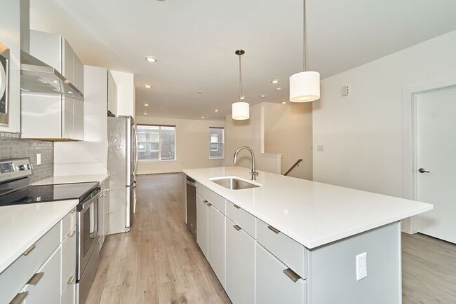 Building Photo - Like New Townhome With Your Own Rooftop Views of Downtown Indy!