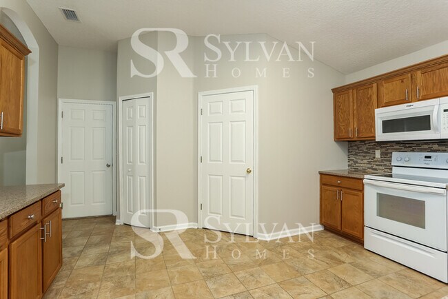 Building Photo - Lease today! No extra charge for contentme...