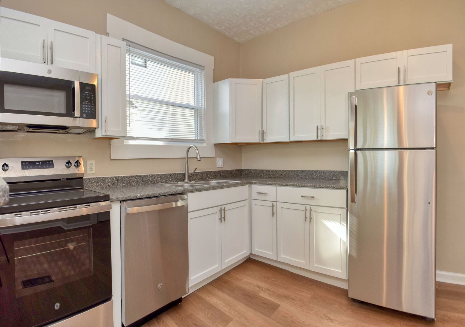 Building Photo - Bates-Hendricks/Newly Remodeled 3 Bedroom Half Double