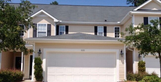Building Photo - BRAND NEW FLOORING & FRESH PAINT - 3 Bedroom/2.5 Bath Townhome with garage in Wild Wing!