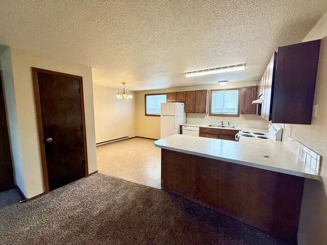 Building Photo - TWO WEEKS FREE RENT - Water/Sewer/Trash Included - Large Two Bedroom One Bath In North Loveland! ...