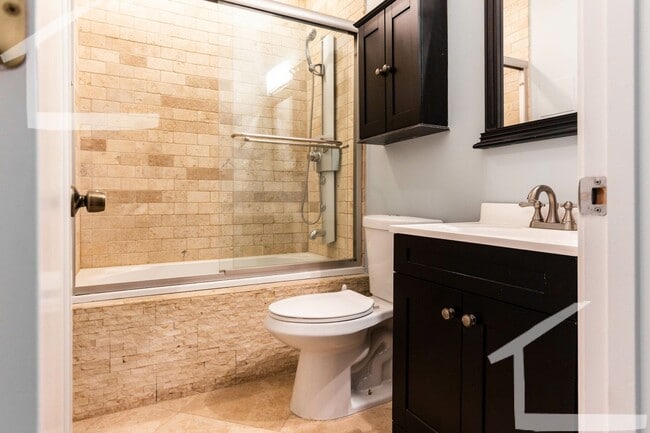 Building Photo - Convenient South End Location, Central Heat/AC, In-Unit Washer and Dryer, Private Deck.