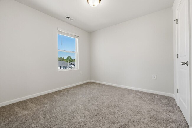 Building Photo - Move-In Ready 4BR Home | Deck, Patio & Open Concept Living