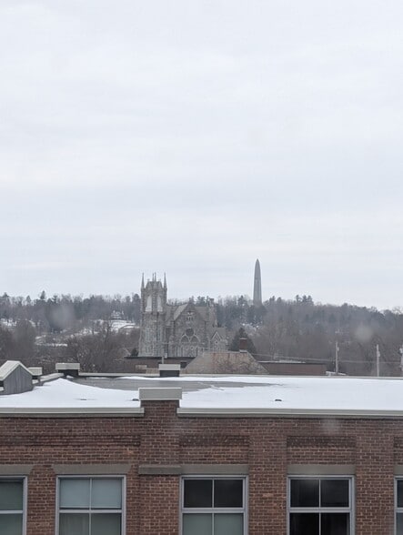 Eastern View of Monument & St. Francis DeSales - 332 Main St
