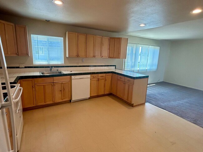 Building Photo - 14205-14211 Doolittle Dr.