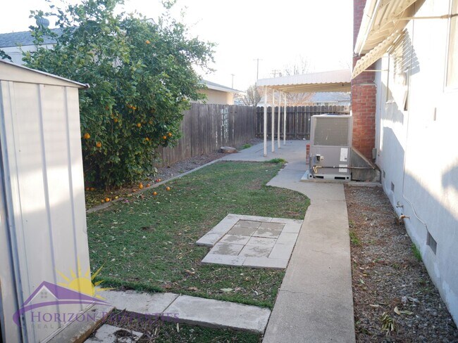 Building Photo - Bright 3 bed 2 bath 1,356 sq. ft. Single Family Home In Woodland