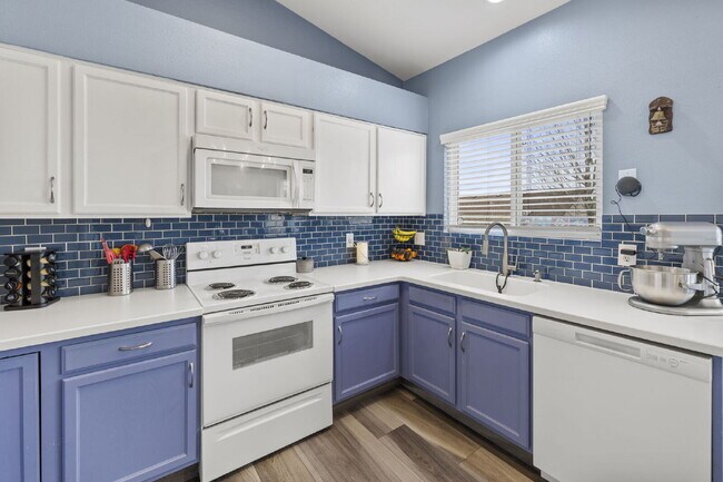 Building Photo - Spacious 4-Bedroom Home with Fenced Yard, 2-Car Garage & Scenic Views in Cheyenne Meadows