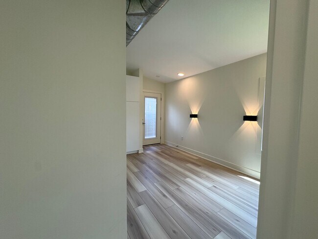 Building Photo - Vaulted Ceilings & Hardwood Floors in This Charming Indianapolis L