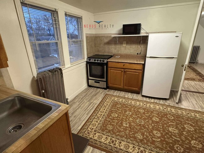 Building Photo - 21-16 73rd St