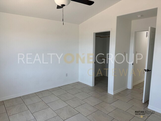 Building Photo - Three Bedroom Two Bath Home with All Tile ...