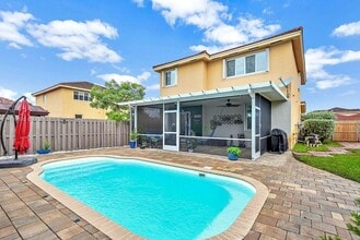 Building Photo - 8986 SW 214th Terrace