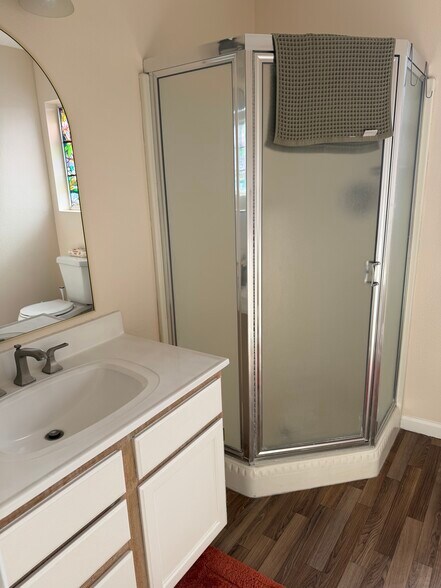 Corner shower - 14902 Eastwood Ave