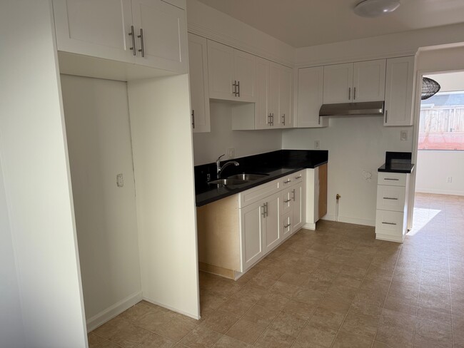 New flooring in kitchen - 11954 Eucalyptus Ave