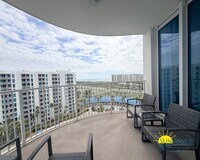Building Photo - Resort-Style 2BR Condo with Gulf Views at The Palms of Destin – Fully Furnished!