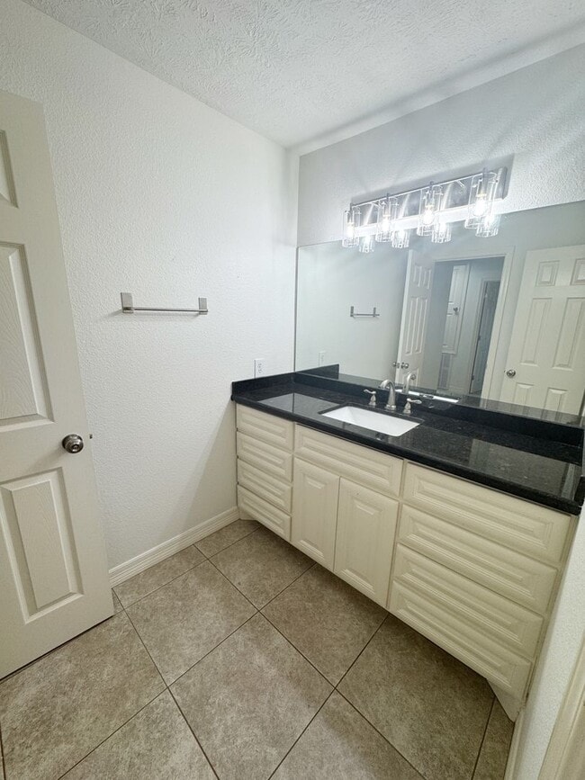 Building Photo - 310 W Pineshadows Dr