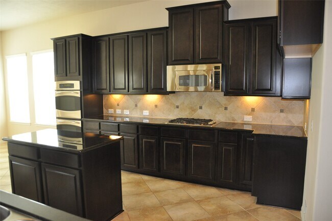 Building Photo - 8161 Tranquil Lake Way