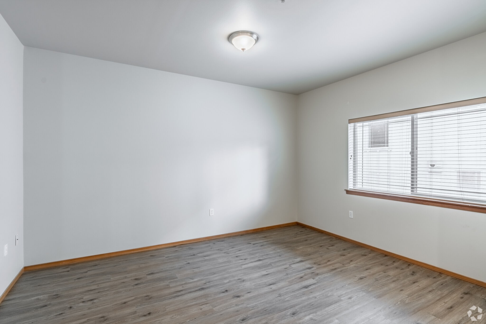 1BR, 1BA - 700SF - Living Room - Sunset Terrace