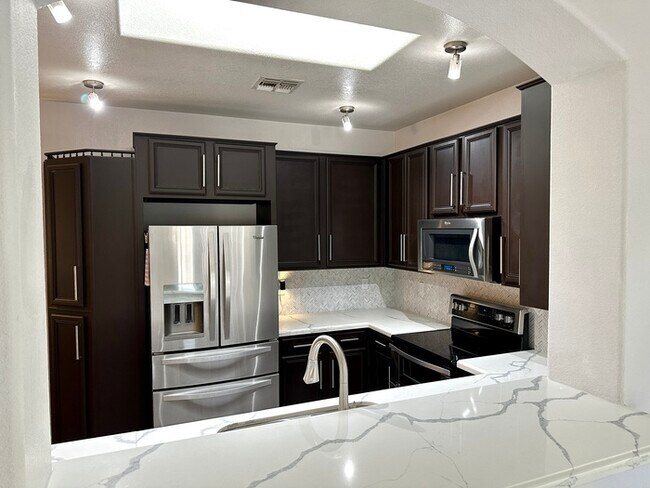 Building Photo - Gorgeous remodel update! No neighbors behind hillside lot