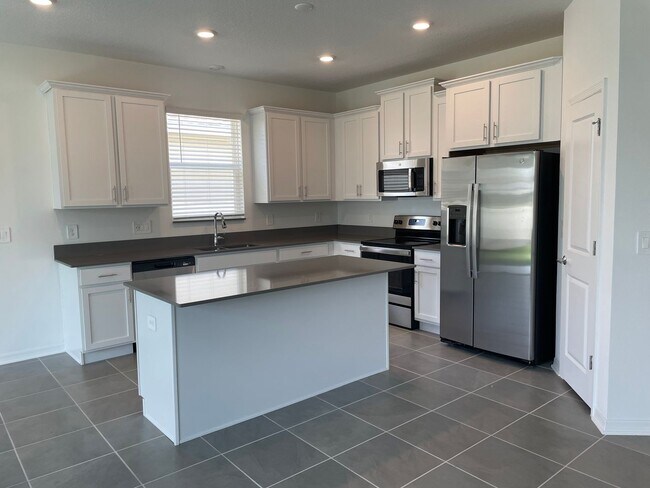 Building Photo - 4 bedroom home $2,195/mo, Storey Creek