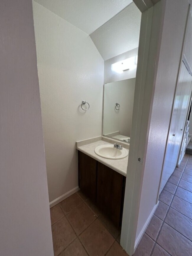 Building Photo - Spacious Condo with Private Patio