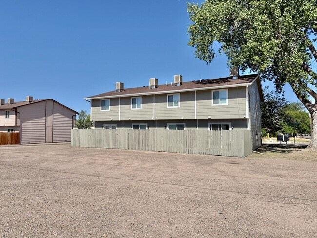 Building Photo - Two-Level 2BR with Fenced Yard & Washer/Dryer Hookups