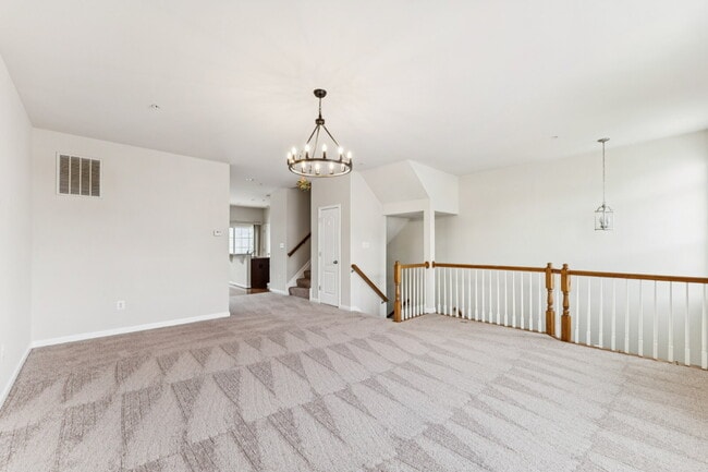 Building Photo - Charming town home located in a quiet, tree-lined community Field stone!