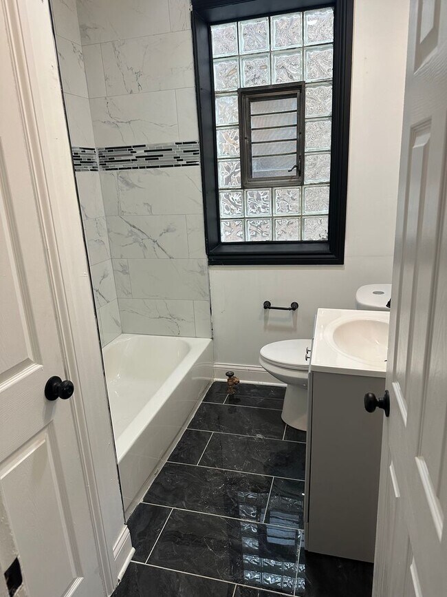 Building Photo - 8040 S Langley Ave