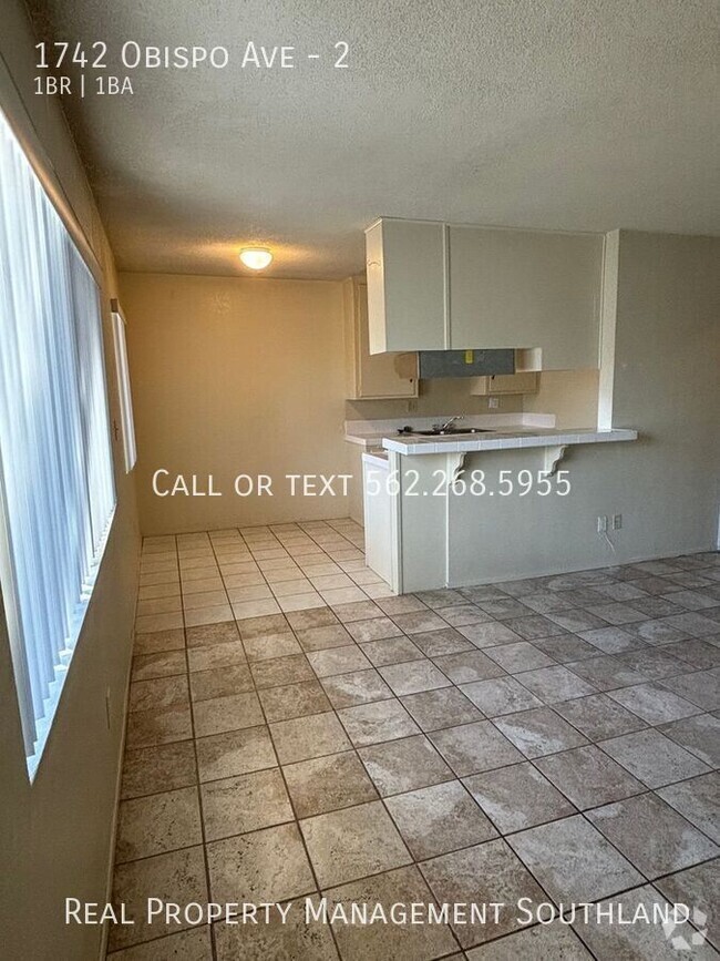 Building Photo - Spacious 1 BD + 1 Bath in gated building i...