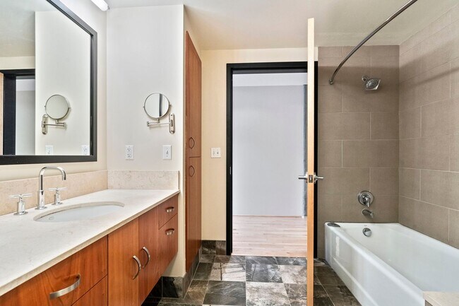 Building Photo - Elizabeth Lofts - 7th floor west facing Pearl District studio w/parking/concierge/most utilities