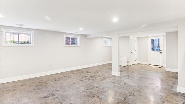 Building Photo - Modern 3BR/2.5BA Row Home with Parking & Private Backyard in SE DC