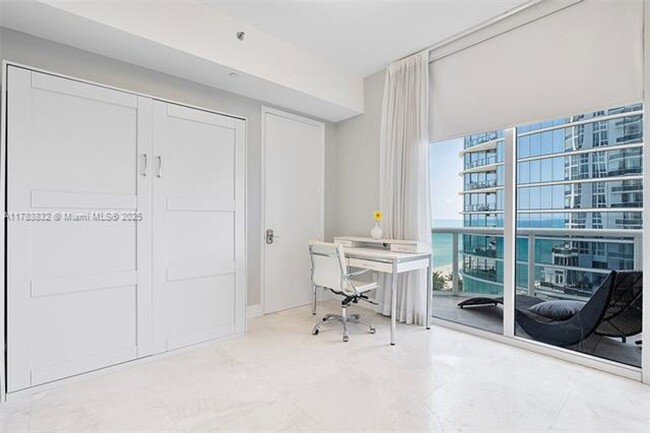 Building Photo - 15811 Collins Ave