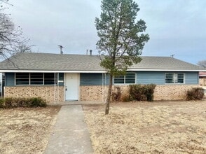 Building Photo - "Charming Lubbock with Spacious Ambiance – 1,479 Sq Ft Oasis on 40th Street!"