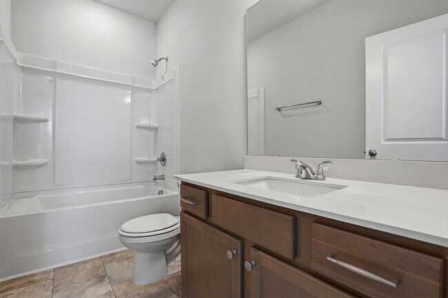 Building Photo - BRAND NEW TOWNHOME-9 FOOT CEILINGS-TWO CAR GARAGE-POOL COMMUNITY