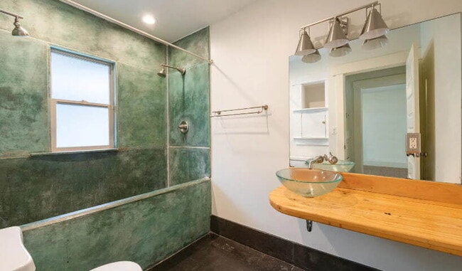 Building Photo - "Charming 2-Bedroom Retreat with Hardwood ...
