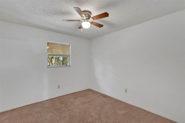 Building Photo - Comfortable & Spacious 3BR Condo with Built-In Closets and Backyard Patio in Tavares Community