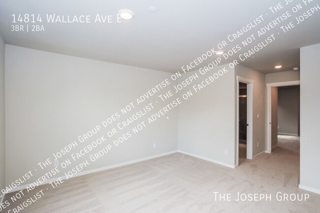 Building Photo - 14814 Wallace Ave E